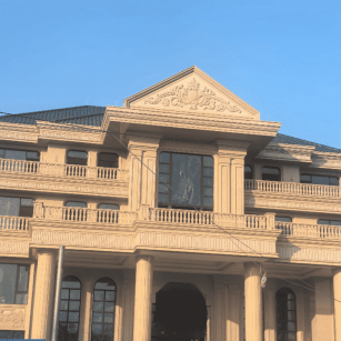 保山黄金麻别墅外墙干挂石材效果示例