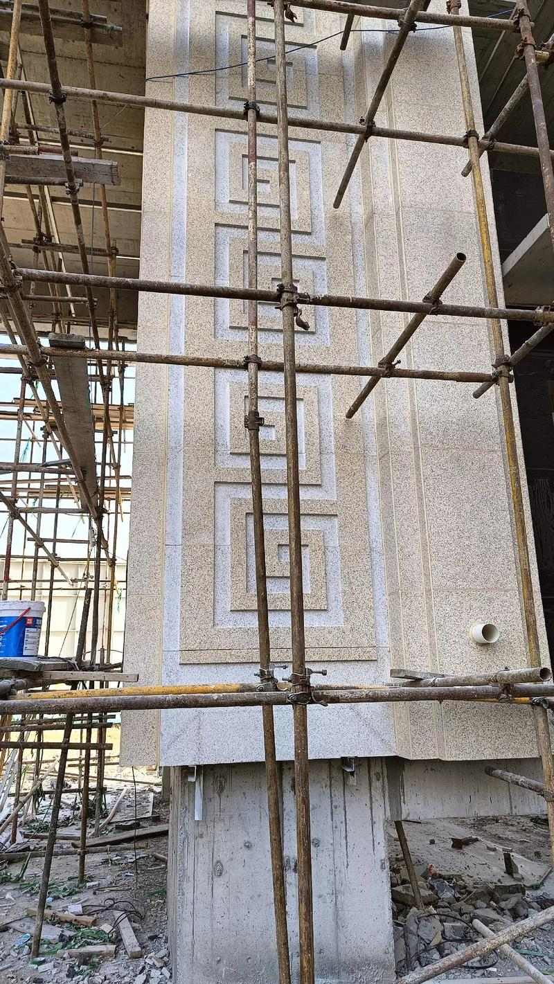 保山 黄金麻花岗岩别墅外墙干挂回纹造型效果