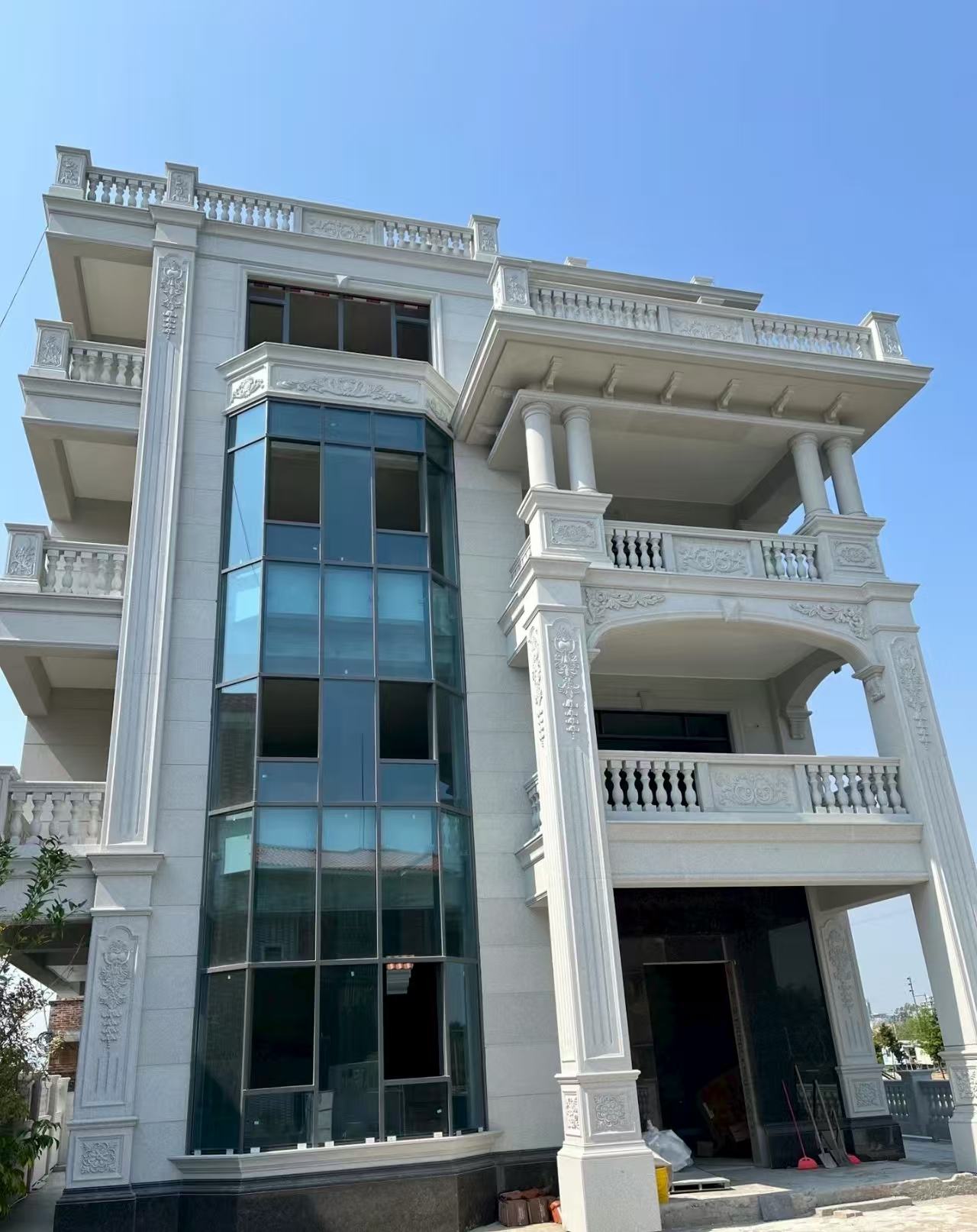 保山 白麻花岗岩别墅外墙干挂效果展示