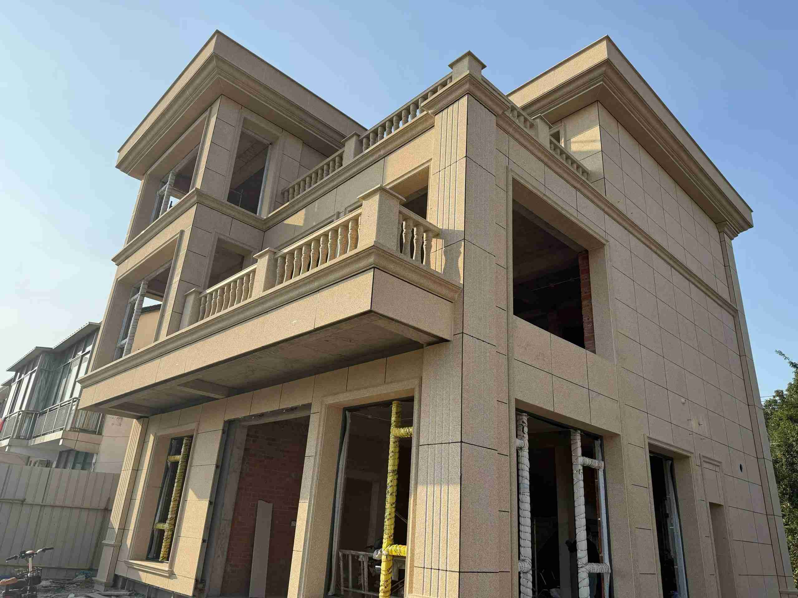 保山 黄金麻花岗岩石材荔枝面外墙干挂效果展示